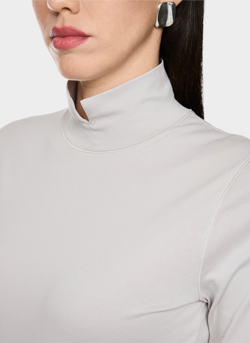 Marc Cain Collections blouse with decorative cufflinks