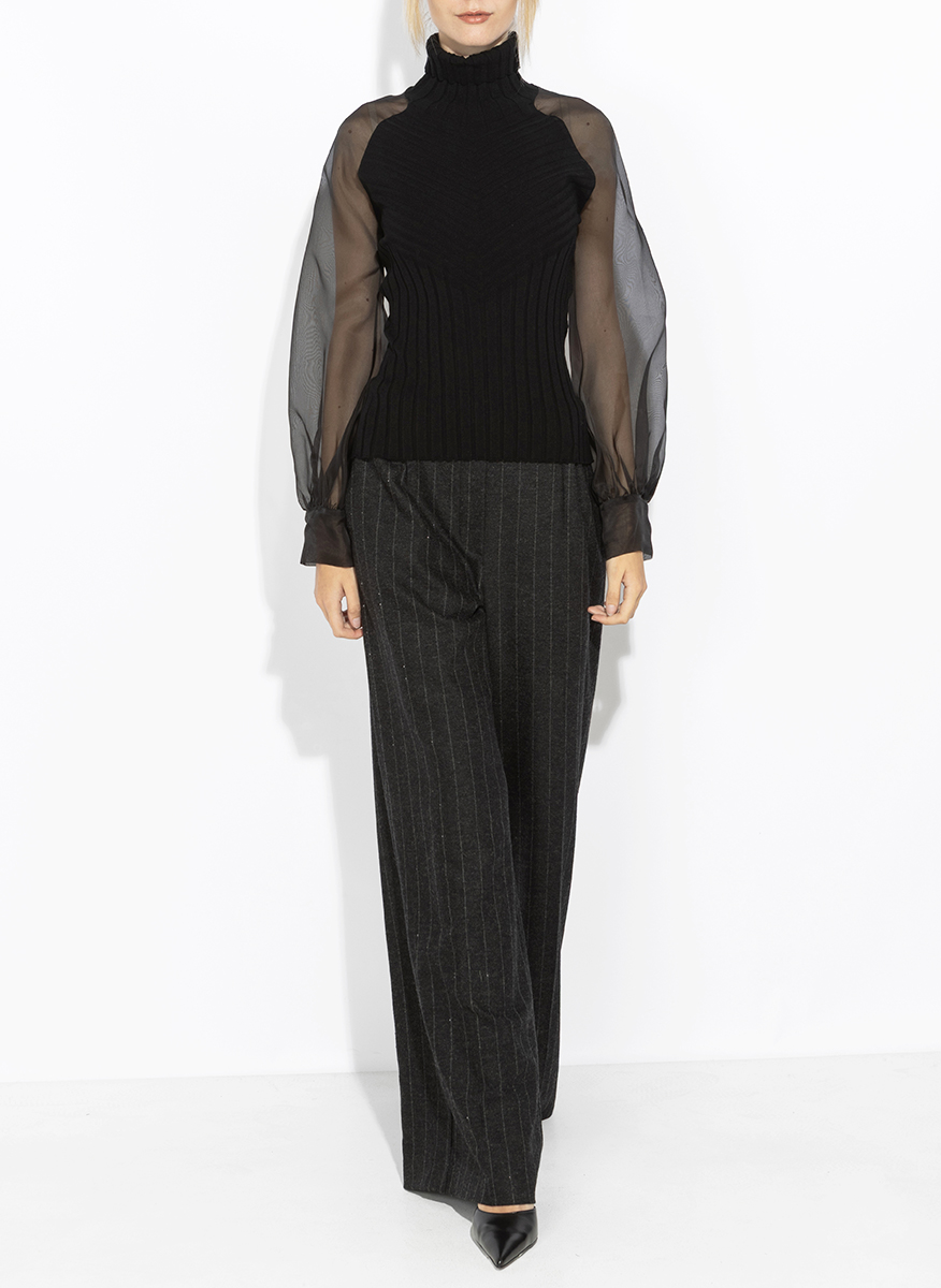 D.Exterior sheer-effect blouse