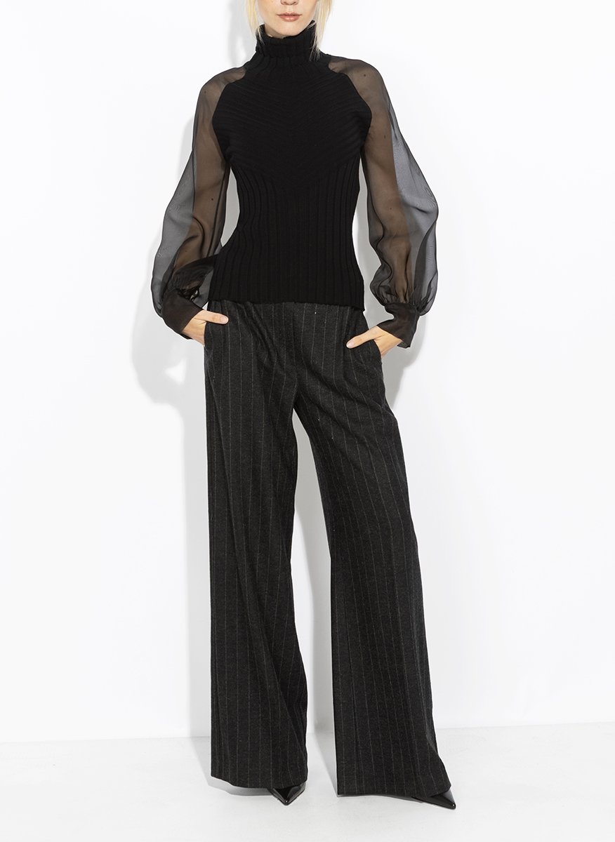 D.Exterior sheer-effect blouse