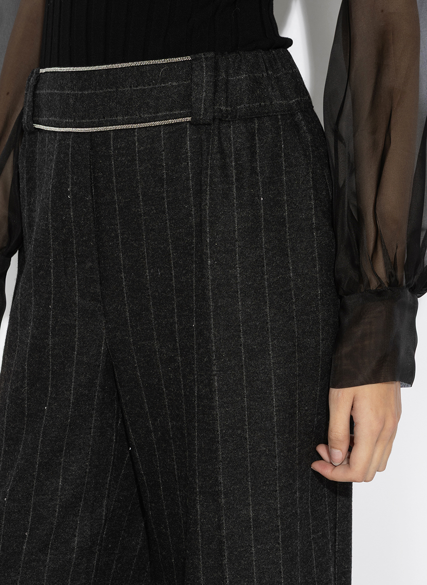 D. Exterior striped wool trousers